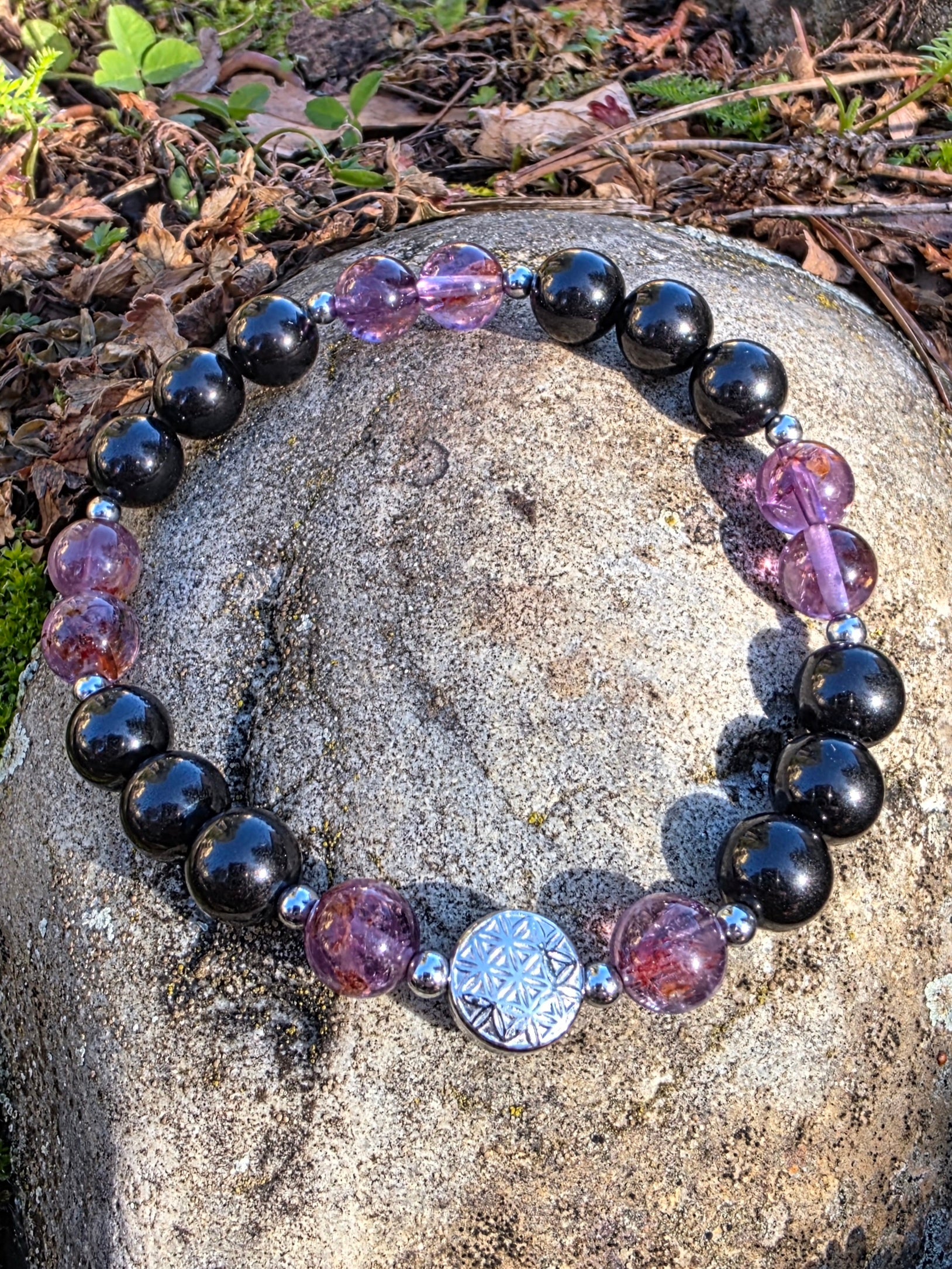 Bracelet en Super seven et Spinelle noire en 8mm avec fermoir en acier inoxydable Lithothérapie Fait main